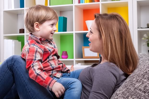 child and parent playing together